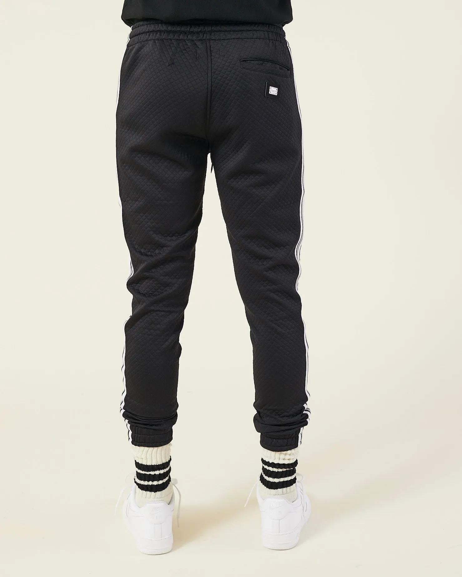 QUILTED TECH JERSEY SWEATPANTS